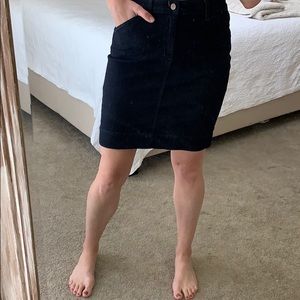 Stretchy dark wash jean skirt.